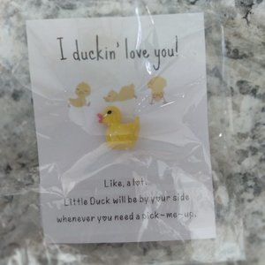 Pocket hug resin duck. "I Duckn' love you" Cute novelty duck.